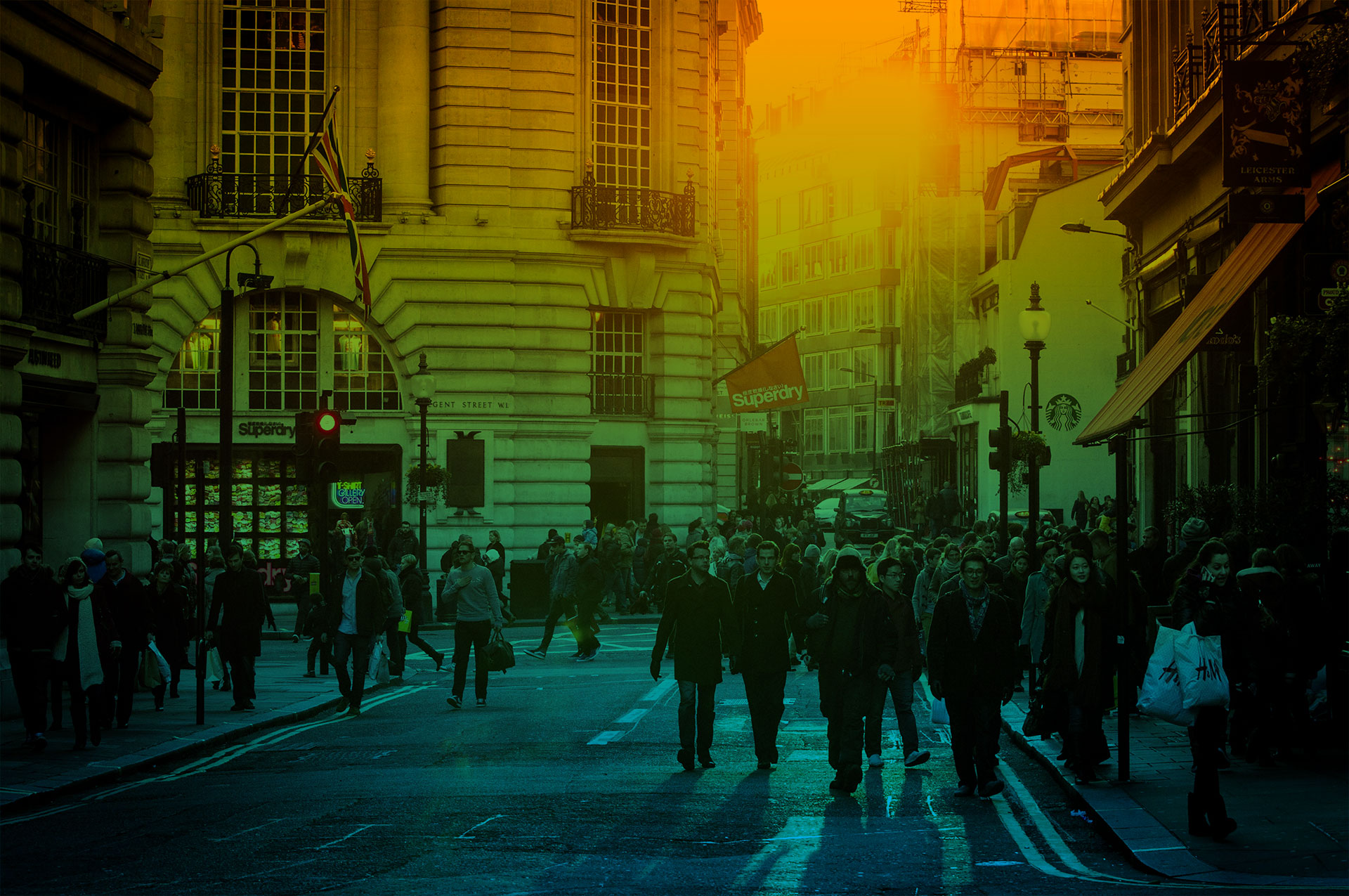 Photo of people in a street scene with green-blue gradient