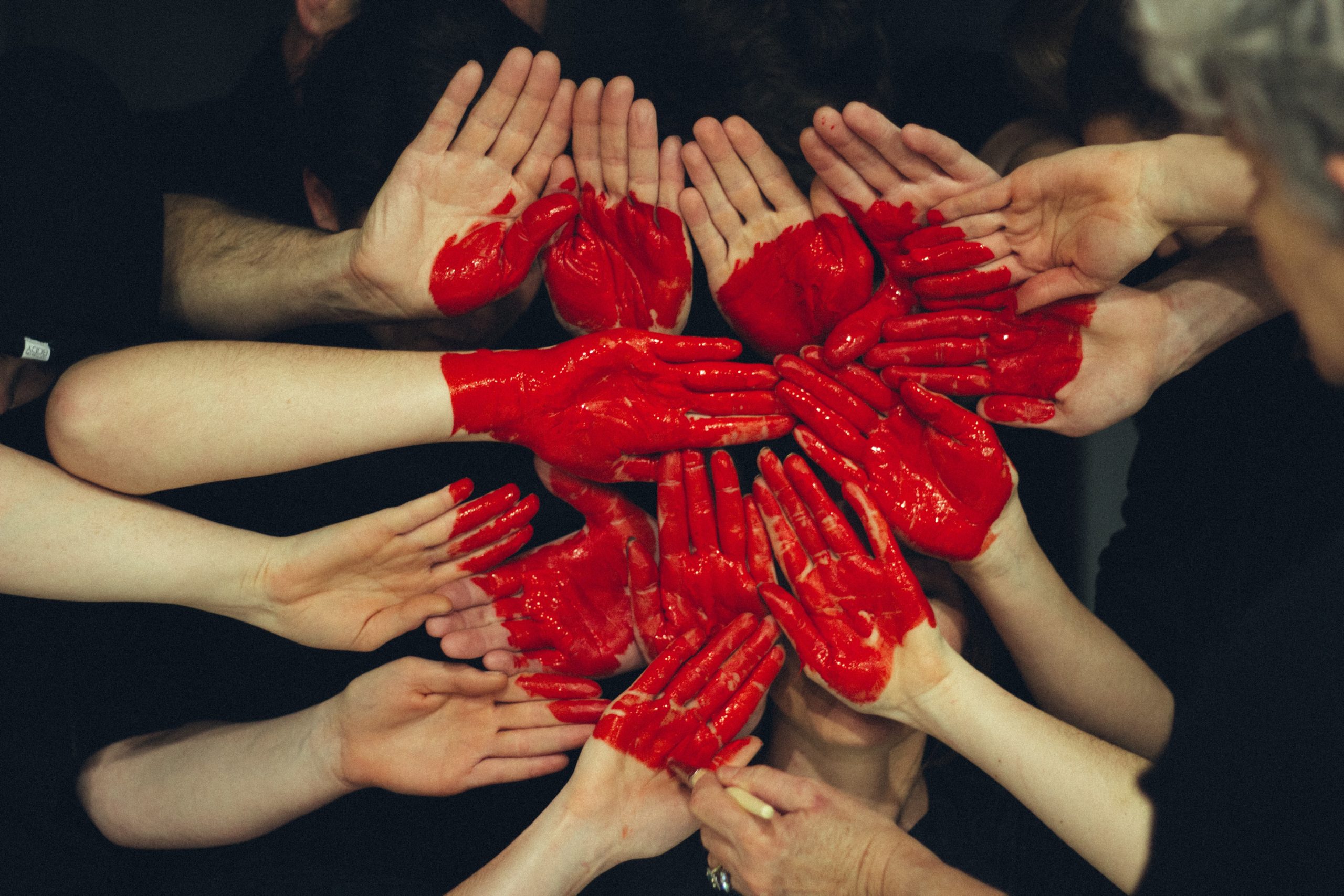 photo of heart painted on hands